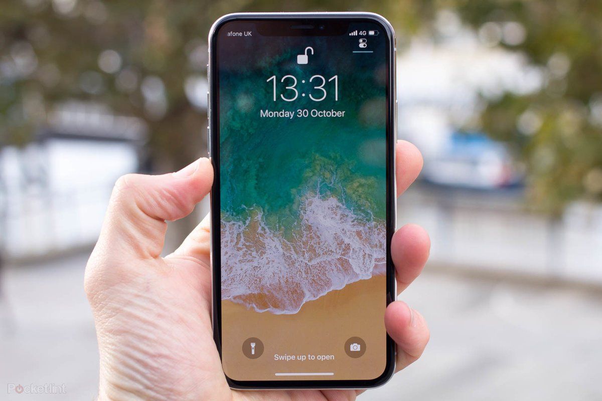 hand holding apple iPhone x